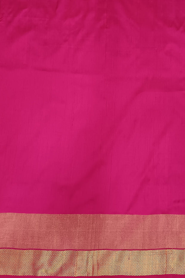Handowoven ikat pure silk saree  in blue with  floral motifs  and a temple border.