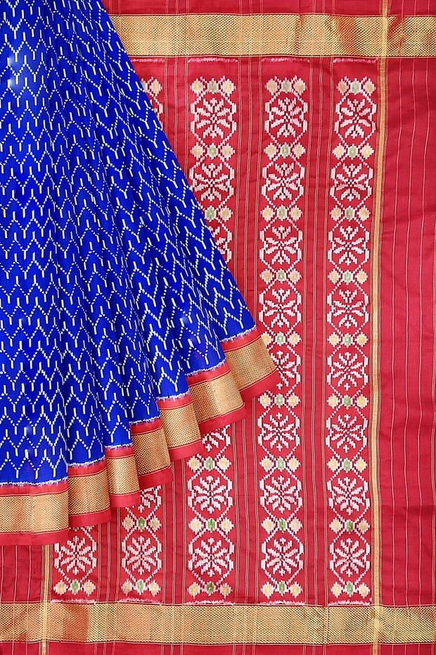 Handwoven ikat pure silk saree in geometric pattern pattern with floral motifs in pallu.