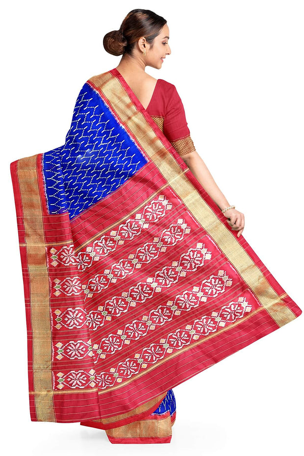 Handwoven ikat pure silk saree in geometric pattern pattern with floral motifs in pallu.