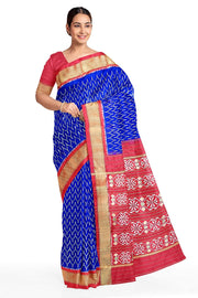 Handwoven ikat pure silk saree in geometric pattern pattern with floral motifs in pallu.