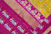 Handwoven Ikat pure silk saree in navratan pattern with a skirt border.