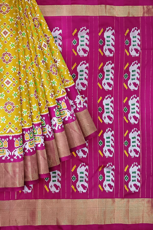 Handwoven Ikat pure silk saree in navratan pattern with a skirt border.