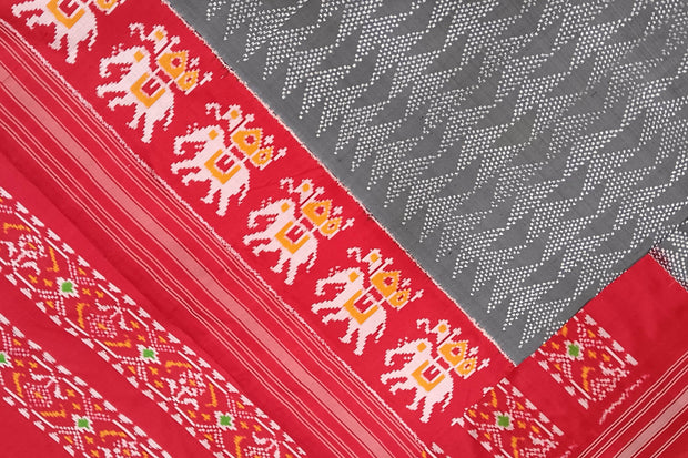 Handwoven  ikat pure silk saree in grey in geometric pattern