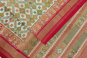 Ikat silk tissue saree in off white & red in pan bhat pattern