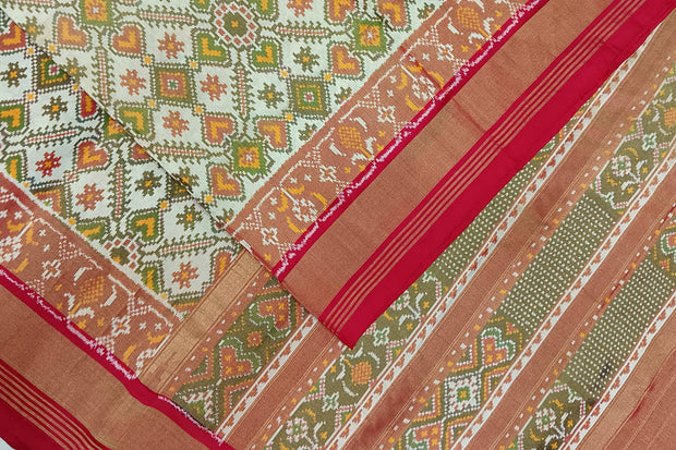 Ikat silk tissue saree in off white & red in pan bhat pattern