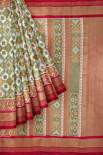 Ikat silk tissue saree in off white & red in pan bhat pattern