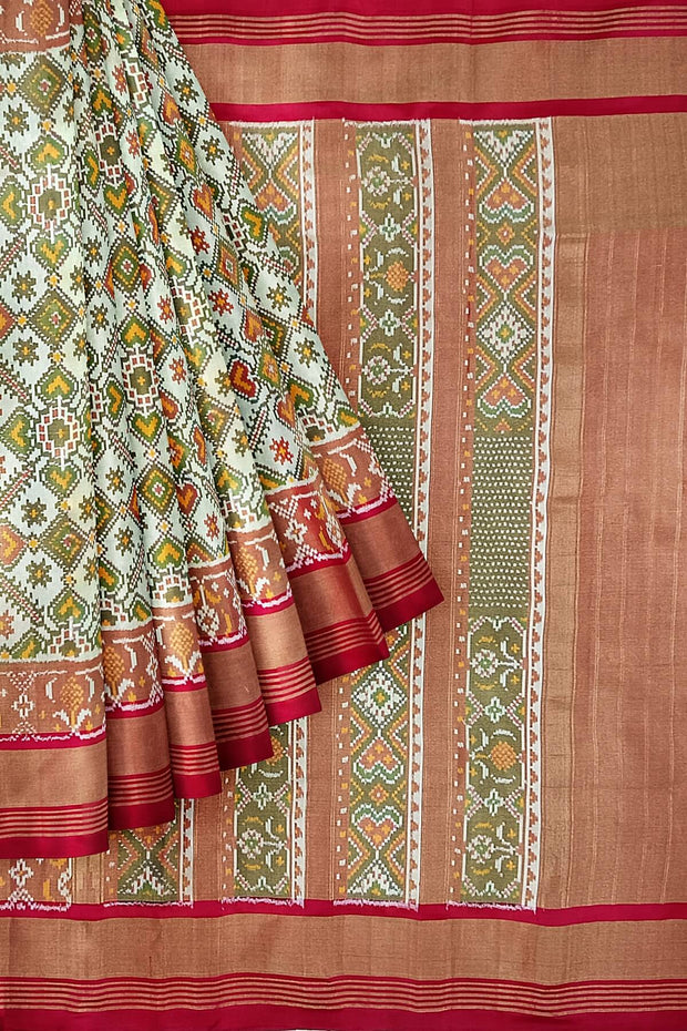 Ikat silk tissue saree in off white & red in pan bhat pattern