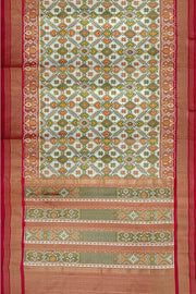 Ikat silk tissue saree in off white & red in pan bhat pattern