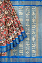 Ikat silk tissue saree in blue in chabdi kunj (elephant in circle) pattern.