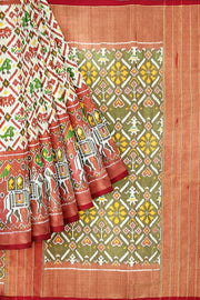 Ikat silk tissue saree in off white  in narikunj pattern and a contrast pallu.