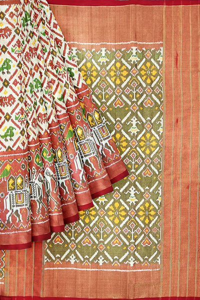Ikat silk tissue saree in off white  in narikunj pattern and a contrast pallu.