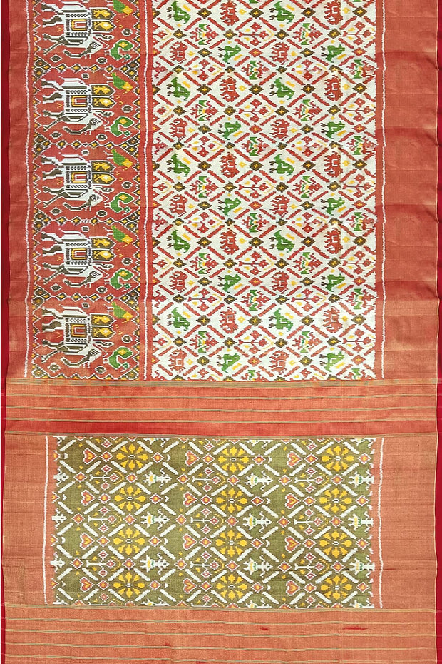 Ikat silk tissue saree in off white  in narikunj pattern and a contrast pallu.