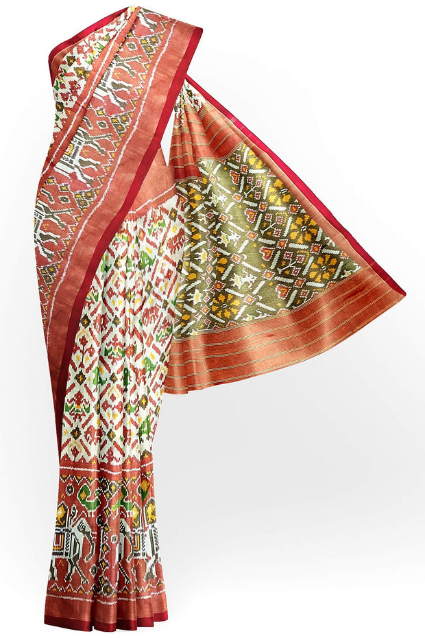 Ikat silk tissue saree in off white  in narikunj pattern and a contrast pallu.