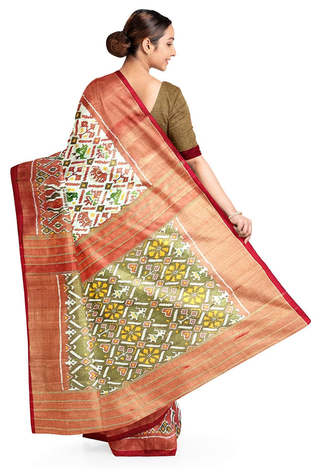 Ikat silk tissue saree in off white  in narikunj pattern and a contrast pallu.