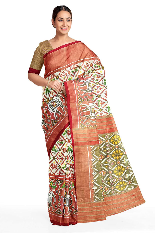 Ikat silk tissue saree in off white  in narikunj pattern and a contrast pallu.
