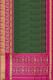 Handwoven ikat pure silk saree in bottle green in fine checks with bird motifs in skirt border .