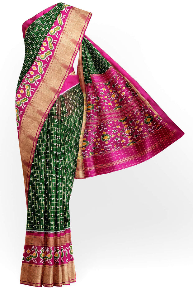 Handwoven ikat pure silk saree in bottle green in fine checks with bird motifs in skirt border .