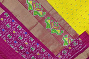 Handwoven ikat pure silk saree in  yellow in fine checks with bird motifs in skirt border