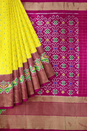 Handwoven ikat pure silk saree in  yellow in fine checks with bird motifs in skirt border