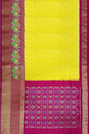 Handwoven ikat pure silk saree in  yellow in fine checks with bird motifs in skirt border