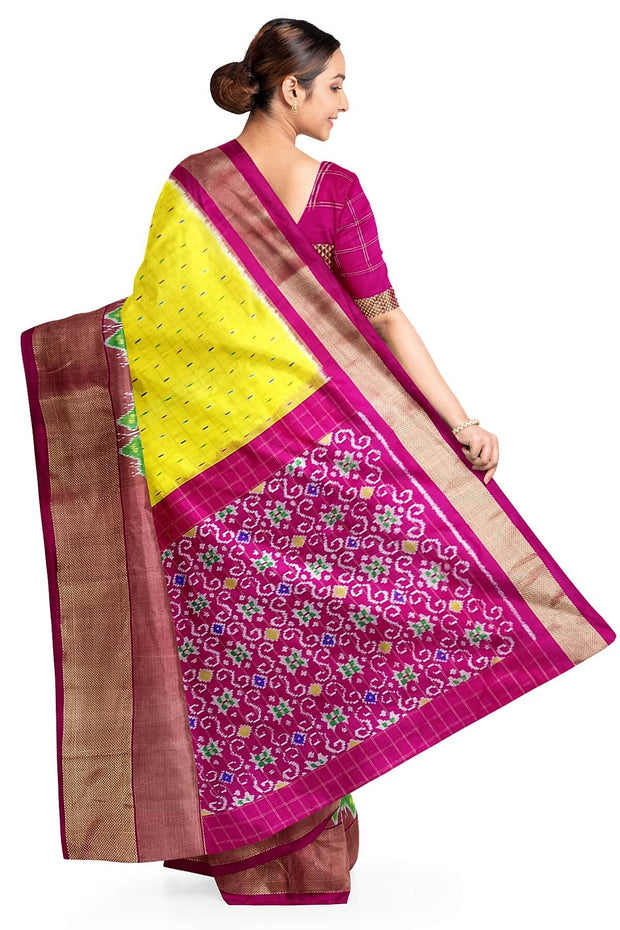 Handwoven ikat pure silk saree in  yellow in fine checks with bird motifs in skirt border
