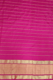 Handwoven ikat pure silk saree in green  in fine checks with elephant motifs in skirt border