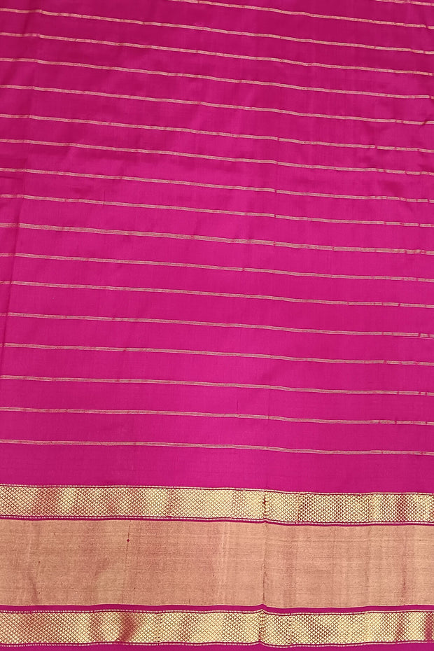 Handwoven ikat pure silk saree in green  in fine checks with elephant motifs in skirt border