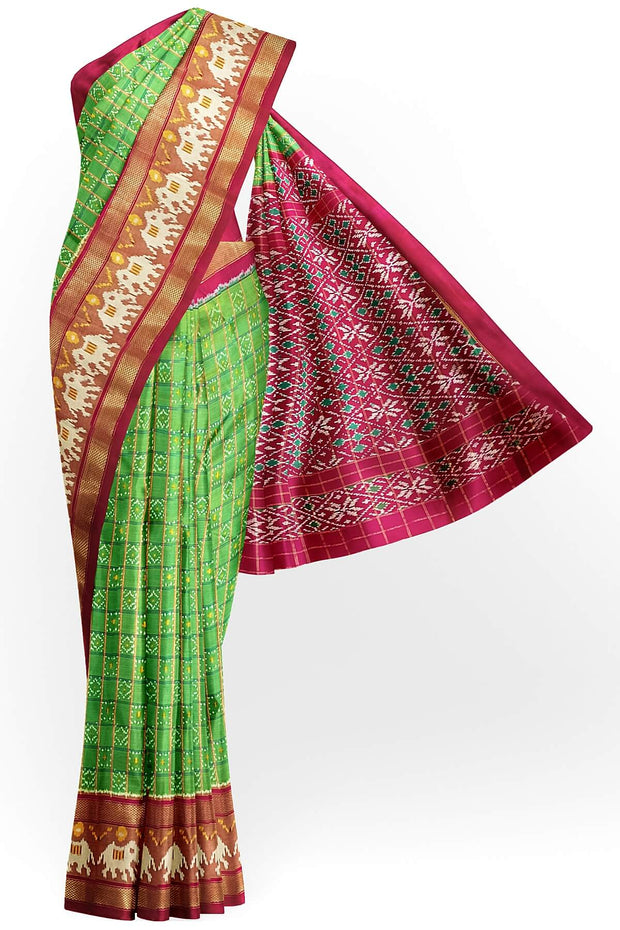Handwoven ikat pure silk saree in green  in fine checks with elephant motifs in skirt border