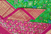 Handwoven ikat pure silk saree in green in navratan pattern