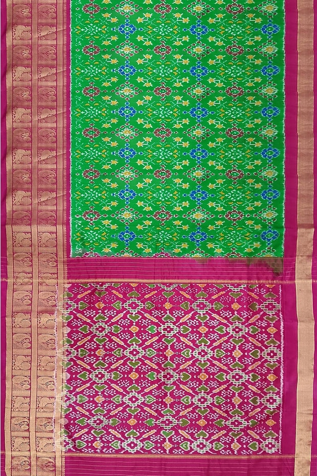 Handwoven ikat pure silk saree in green in navratan pattern
