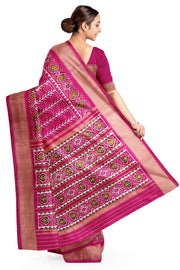 Handwoven ikat pure silk saree  in pink  in  combination of diamond &  pan bhat patterns.