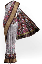 Handwoven ikat pure silk saree  in mauve  in  combination of diamond &  pan bhat patterns.