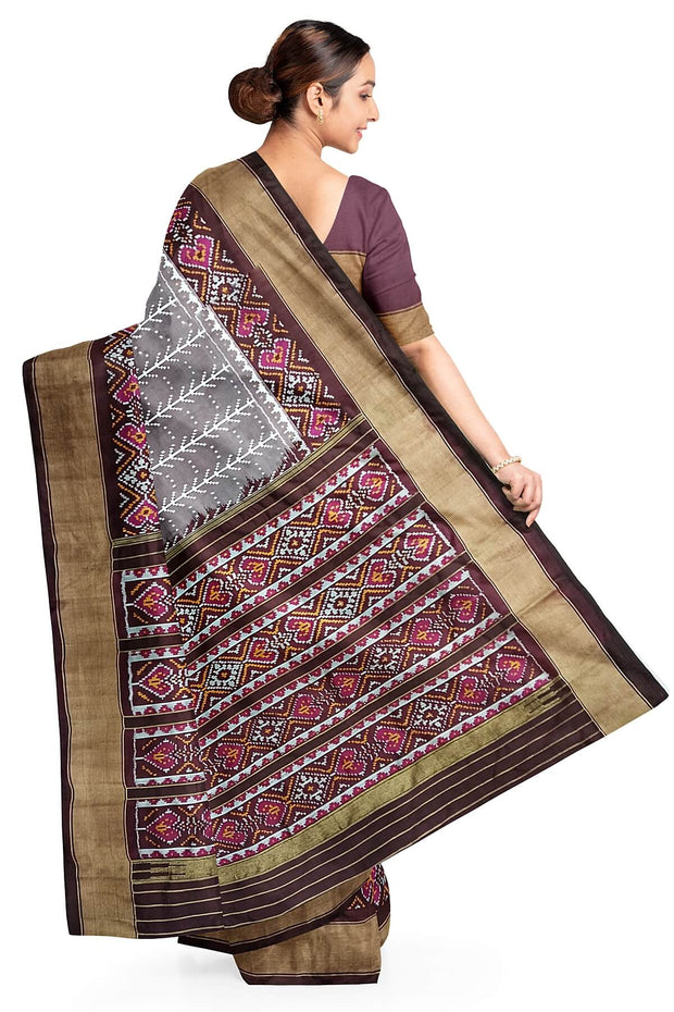 Handwoven ikat pure silk saree  in mauve  in  combination of diamond &  pan bhat patterns.