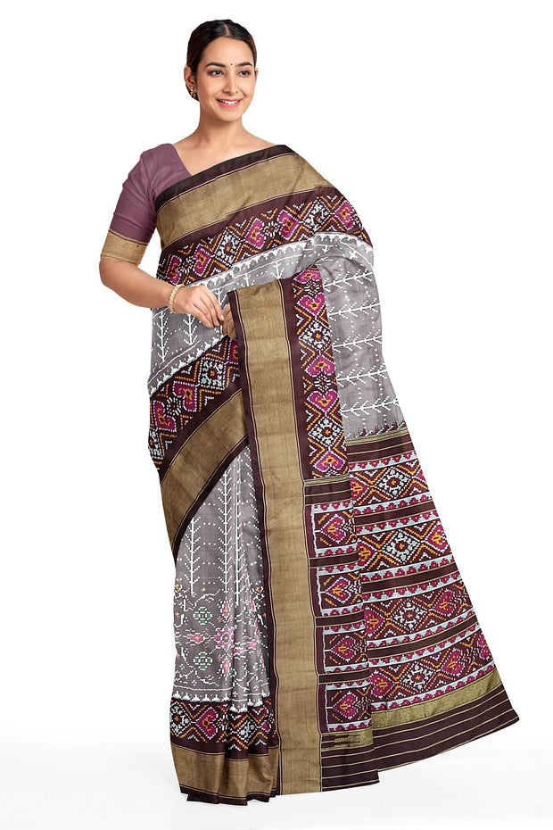 Handwoven ikat pure silk saree  in mauve  in  combination of diamond &  pan bhat patterns.