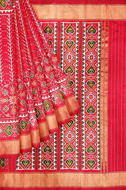 Handwoven ikat pure silk saree  in red in  combination of diamond &  pan bhat patterns.