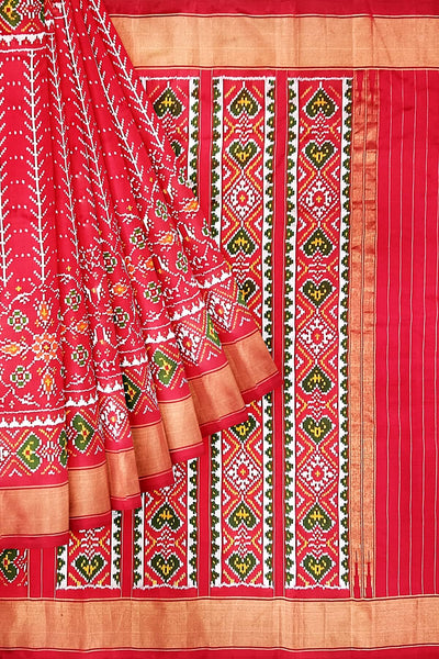 Handwoven ikat pure silk saree  in red in  combination of diamond &  pan bhat patterns.