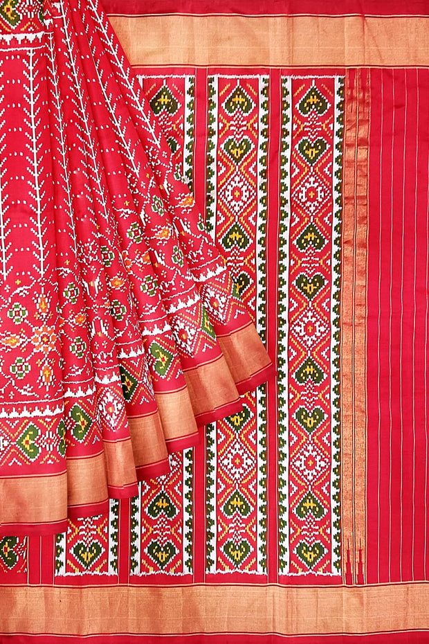Handwoven ikat pure silk saree  in red in  combination of diamond &  pan bhat patterns.