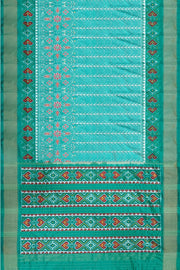 Handwoven ikat pure silk saree  in teal green  in  combination of diamond &  pan bhat patterns.