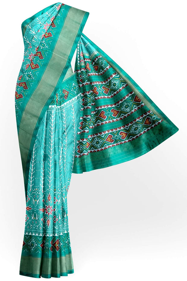 Handwoven ikat pure silk saree  in teal green  in  combination of diamond &  pan bhat patterns.