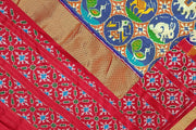 Ikat pure silk saree in double shaded blue with plant & animal pattern on  the body.