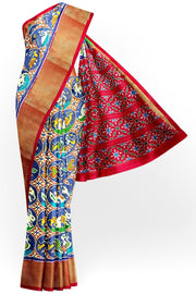 Ikat pure silk saree in double shaded blue with plant & animal pattern on  the body.