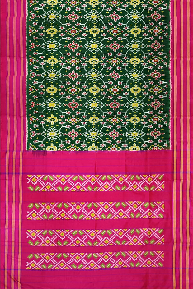 Ikat pure silk saree in bottle green in navaratan pattern