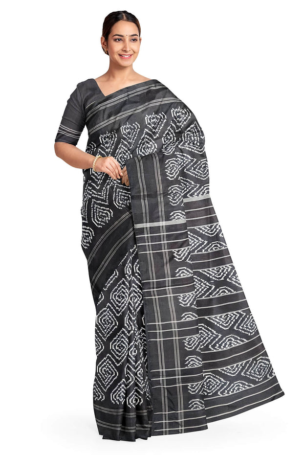 Handwoven ikat pure silk saree in black in  loop pattern  with silk borders