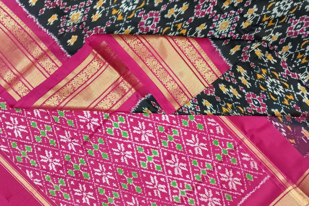 Handwoven ikat pure silk saree in black in navratan pattern