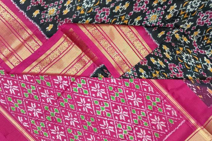 Handwoven ikat pure silk saree in black in navratan pattern