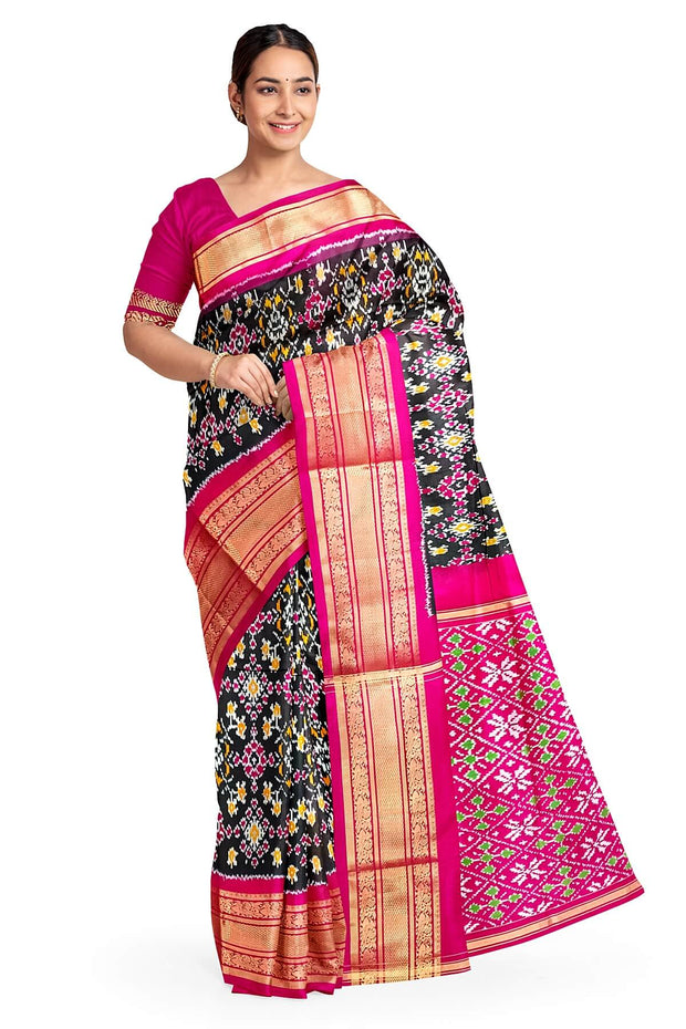 Handwoven ikat pure silk saree in black in navratan pattern