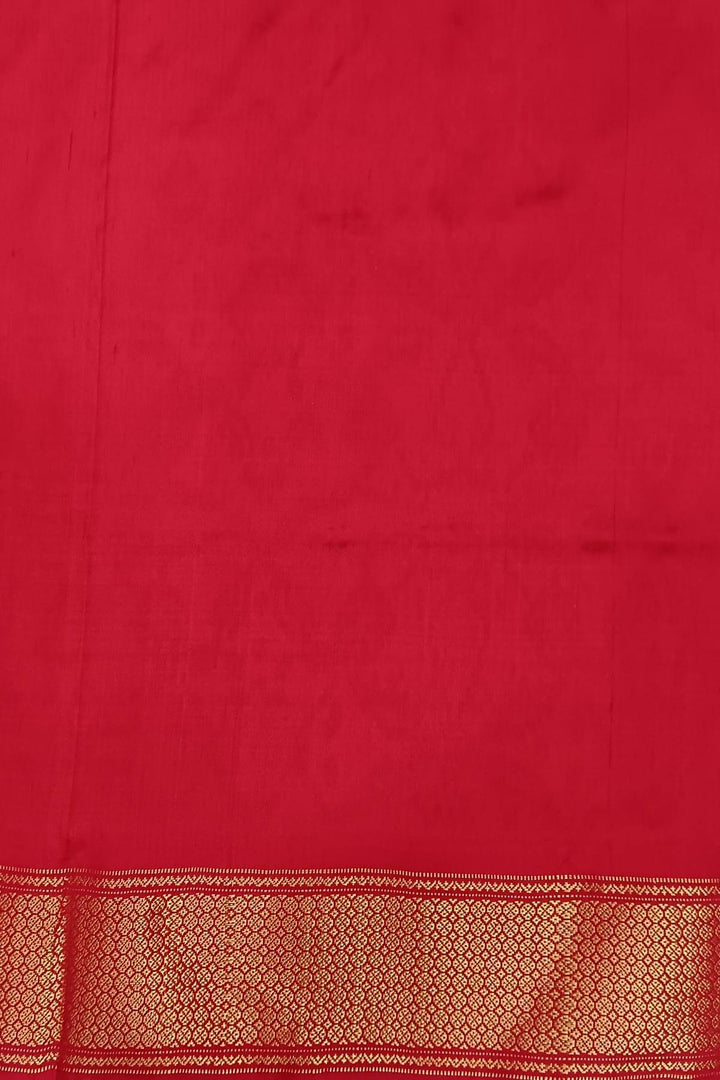 Handwoven ikat pure silk saree in off white in pan bhat pattern