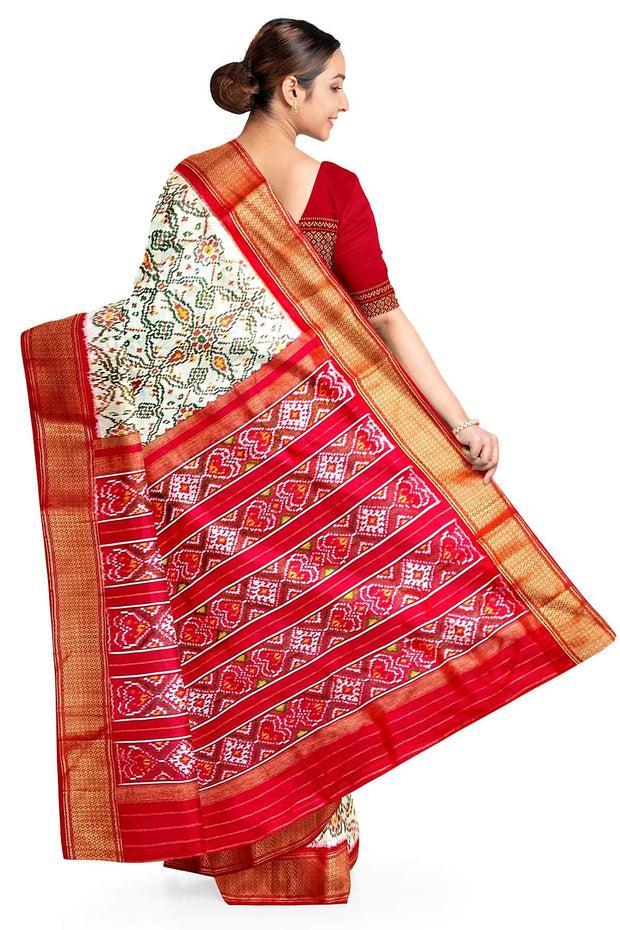 Handwoven ikat pure silk saree in off white in pan bhat pattern