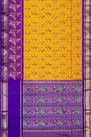 Handwoven ikat silk tissue saree in mustard with parrot motifs