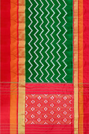 Ikat pure silk saree in dark green in zigzag pattern